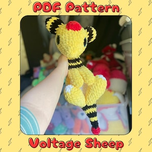 May include: A handmade yellow plush Voltage Sheep with black and yellow stripes, red accents, and white details. The plushie is held up in front of a blurred background. The text "PDF Pattern" and "Voltage Sheep" are displayed.