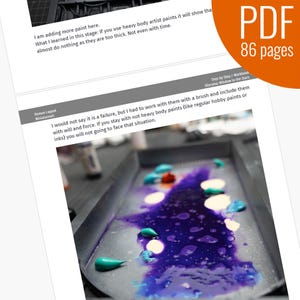 May include: A close-up of a palette with a variety of colors, including purple, blue, green, and orange. The colors are mixed together, creating a vibrant and colorful scene.