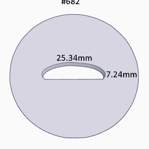 May include: A gray circle with a cutout in the shape of an arch. The arch is 25.34 mm wide and 7.24 mm tall. The circle is labeled #682.