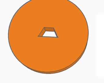 May include: Orange round disc with a small rectangular hole in the center.