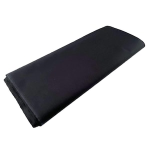 May include: A black fabric swatch, likely for sewing or crafting projects.