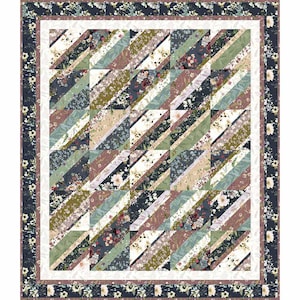 May include: A rectangular quilt featuring a repeating block pattern of diagonal fabric strips. The design incorporates floral prints in shades of navy blue, sage green, dusty rose, and cream, finished with a dark floral border and white trim.
