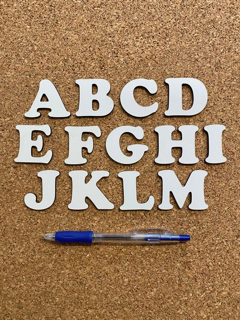 Individual wooden letters in different colors and sizes