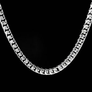 May include: A silver chain necklace with a curb link design.