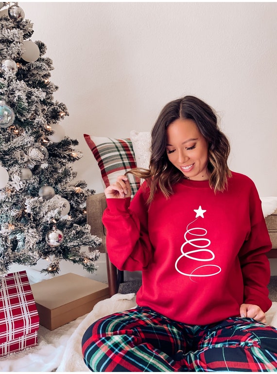 woman within christmas shirts