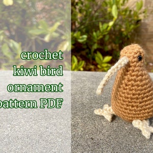 May include: Crochet pattern PDF for a brown kiwi bird ornament. The ornament has a long, thin beak and small, white feet.