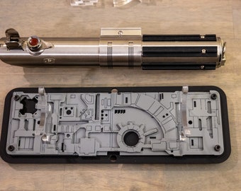 The Trench Run, lightsaber Hilt Display stand for your desk.