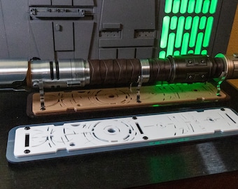Cal Inspired Long Staff Edition Lightsaber Flat Stand made from Beautiful Cast Acrylic. A great gift for that lightsaber lover.