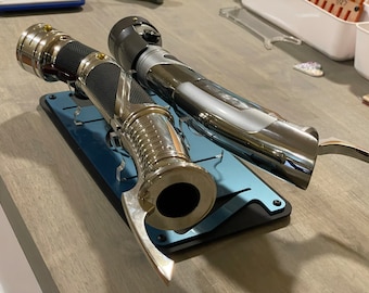 C.D. Legacy Lightsabers Stand made with cast acrylic sheets that are laser cut.