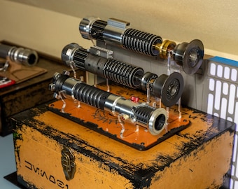 Obi Legacy Lightsaber Box Set Inspired Stand. Custom designed for this saber set.  Made from Beautiful Seamless Laser Cut Cast Acrylic.