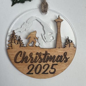 Christmas  2025 Ornament Featuring the Seattle Space Needle, Mt. Rainer and Bigfoot handmade Wood and Acrylic