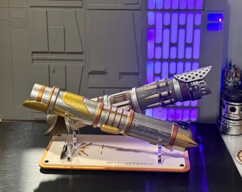 Double Workshop lightsaber stand. Celebrate your trip to off planet made of cast acrylic sheets, holds your saber and pin.