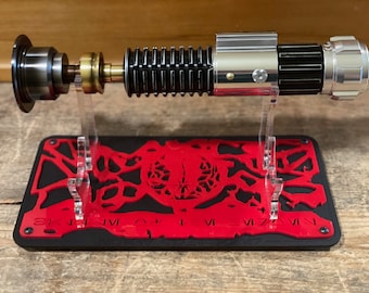 Legacy Lightsaber Stand High Ground. "I have the high ground" Cast Acrylic laser cut Lightsaber Stand for hilts.