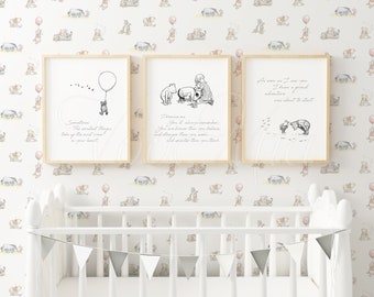 May include: Three framed Winnie the Pooh prints with inspirational quotes. The prints are hung on a white wall with a white crib in the foreground. The wall is covered in a Winnie the Pooh wallpaper with a repeating pattern of Winnie the Pooh characters.