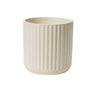 May include: A white ceramic planter with a ribbed design. The planter is cylindrical in shape and has a smooth, matte finish.