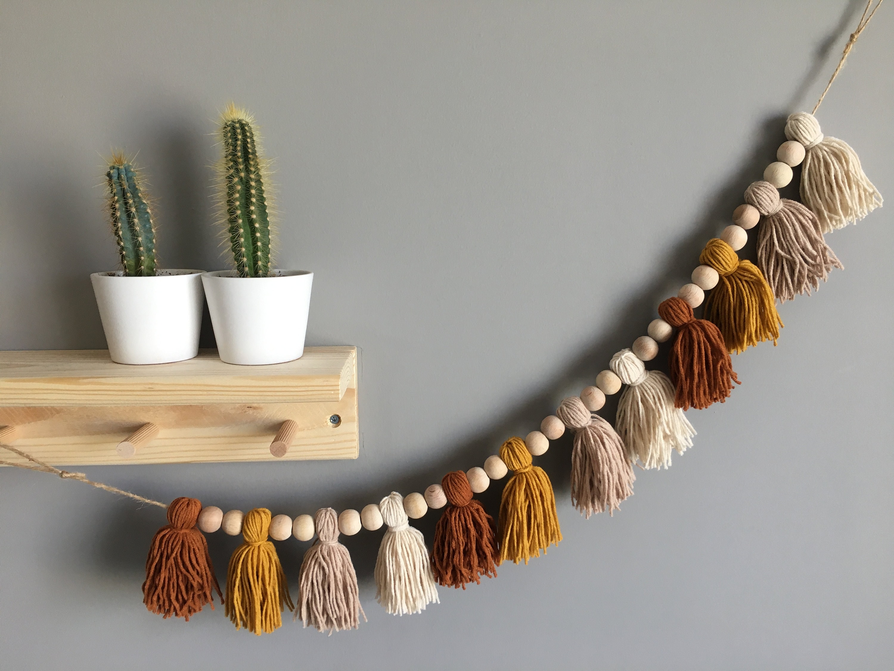 Wooden Bead Garland With Tassel, Farmhouse Beads for Coffee Table, Gifts  for Home Boho Chic Decor, Coastal Wood Bead Garland, Flat Lay Photo 