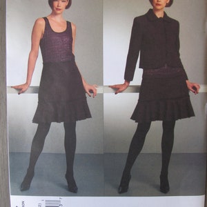 May include: A sewing pattern for a skirt and jacket. The pattern is from Donna Karan New York and is for sizes 6-8-10-12. The pattern number is V1067.