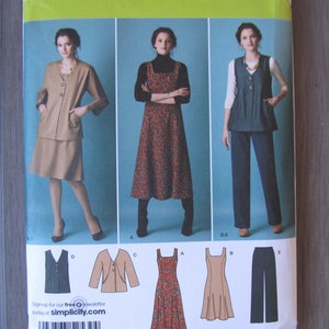 May include: Simplicity sewing pattern number 2539 for sizes AA 10, 12, 14, 16, 18, EUR 36-44, FR 38-46. The pattern includes instructions and templates for making a dress, a vest, a jacket, and pants. The pattern is illustrated with a woman wearing each of the garments.