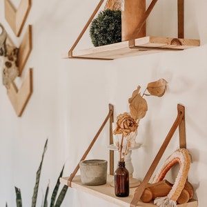 Leather strap shelf