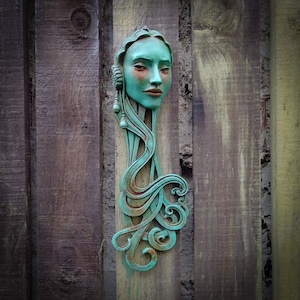 Emily, Art Nouveau inspired sculpture of beautiful female face with long stylised hair, hand painted Verdigris finish, one of a pair