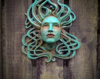 Isla, sculpted beautiful female face with Art Nouveau, Celtic inspired hair with a hand painted faux Verdigris finish finish