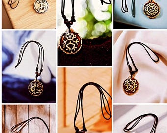 Collares ajustables de doble cara con símbolos taínos