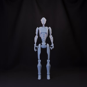 May include: A white articulated robot figure with a humanoid shape. The robot has a head, torso, arms, and legs. The figure is standing on a black surface.
