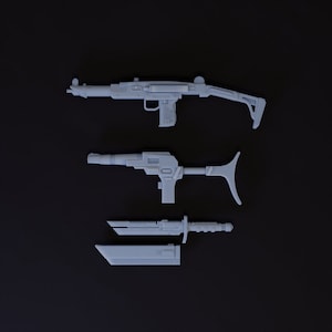 May include: Three gray plastic toy guns, including a submachine gun, a pistol, and a knife. The guns are on a black background.