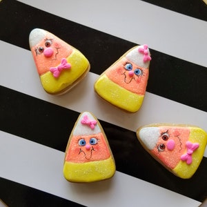 Too cute to Eat fake bake candy corn couple for Halloween decor, tier trays, coffee bats, wreath attachments and more.