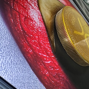 3D Sculpture Melting XRP Coin Lips by Peter Perlegas image 8