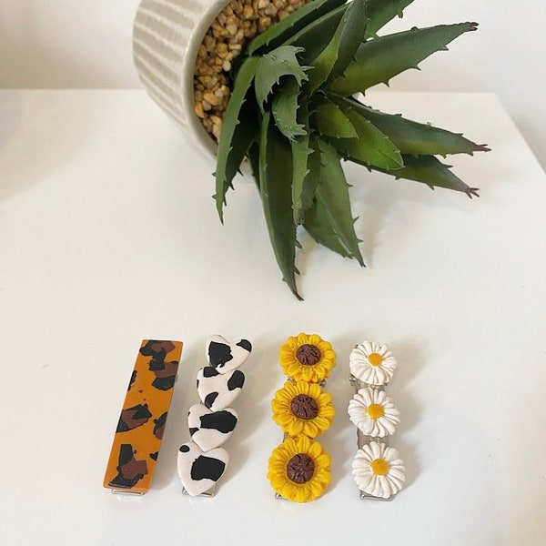 Handmade polymer clay crocodile hair clips, sunflower hair clips, cow print hair clips