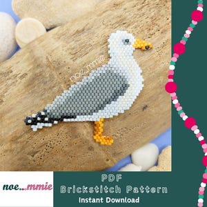 Peut inclure: Une figurine de mouette perlée réalisée avec des perles blanches, grises, noires et jaunes. L'oiseau est représenté de profil avec un bec et des pattes jaunes, une aile grise, et un corps blanc. Le texte "noe_mmie" est visible sur l'aile.