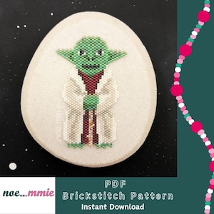 Peut inclure: Un motif Yoda en perles sur une pierre ovale de couleur claire. Le motif présente des perles vertes, blanches et bordeaux. L'image comprend également le texte "PDF Brickstitch Pattern Instant Download".