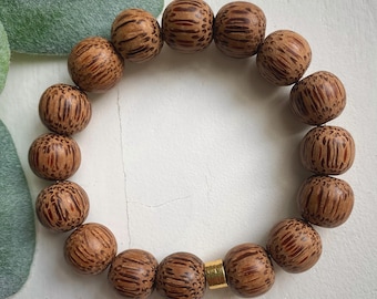 Pulsera de madera de coco Maui: cuentas de madera natural con detalles dorados