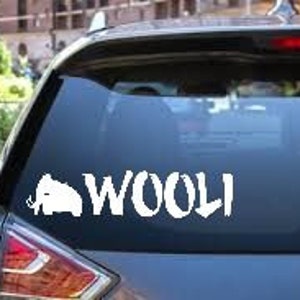 May include: White vinyl decal with a silhouette of an elephant and the word "WOOLI" in a stylised font.