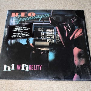 Vintage 1980s Vinyl Record Album REO Speedwagon entitled Hi Infidelity Epic Records Classic Rock