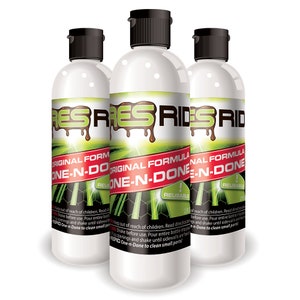 May include: Three white plastic bottles with green and black labels. The bottles are labeled "RES-RIDE'S ORIGINAL FORMULA ONE-N-DONE REUSABLE".