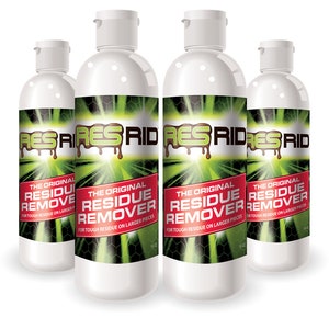 May include: Four white bottles of "Res-Rid" residue remover. The bottles are labeled "The Original Residue Remover" and say "For tough residue on larger pieces".