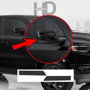 May include: Black side door trim accents for a pickup truck. The trim pieces are made of a durable material and are designed to protect the side doors from scratches and dings. The trim pieces are easy to install and come with all the necessary hardware.