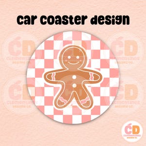May include: Round car coaster design featuring a gingerbread man on a pink and white checkered background. The coaster has the text "car coaster design" in black. The gingerbread man is brown with pink accents.