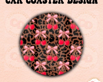 May include: Round brown and black leopard print car coaster with pink bows and red cherries.