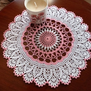 Pink and white handmade doily. 15ins across