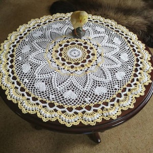 Lemon and white pineapple and hearts doily. 22.5ins (57cms)diameter