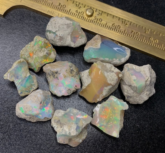 Fine Quality Raw Opal Welo Opal Rough Stone Ethiopian Opal Rough Amazing MultiColor Rough Direct From Mines At Wholesale Price 100% Natural Fine Quality Raw Opal Welo Opal Rough Stone Ethiopian Opal Rough Amazing MultiColor Rough Direct From Mines At Wholesale Price 100% Natural