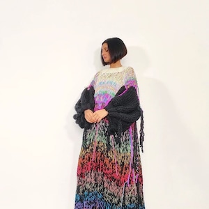 Hand Knit round neck 'Symphony of Dreams' long dress with chunky sleeve, braided ends and drop stitch details