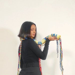 Hand knit 'The Goan Window' multicolored centipede scarf with jacquard structural texture, hand embroidery and handmade braids detailing image 7