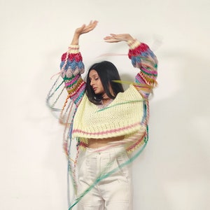 Hand knit 'Spring's Symphony' multicolored, oversized pullover with jacquard structural texture, hand embroidery & handmade braids detailing image 2