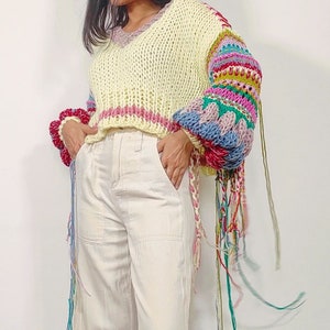 Hand knit 'Spring's Symphony' multicolored, oversized pullover with jacquard structural texture, hand embroidery & handmade braids detailing image 4