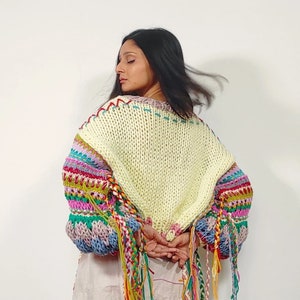 Hand knit 'Spring's Symphony' multicolored, oversized pullover with jacquard structural texture, hand embroidery & handmade braids detailing image 1