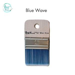 May include: A paint brush with a wooden handle and blue bristles. The brush has a metal band and the text "Blue Wave" is printed on the handle. The brand name "Paint Pixie" is also visible.